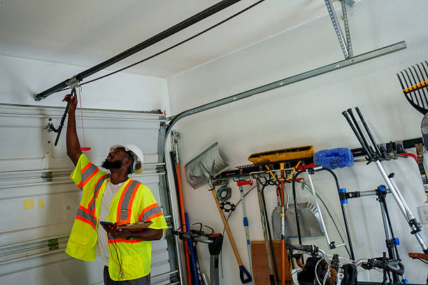 Professional Garage Door Panel Replacement technician working in Oronoco, MN